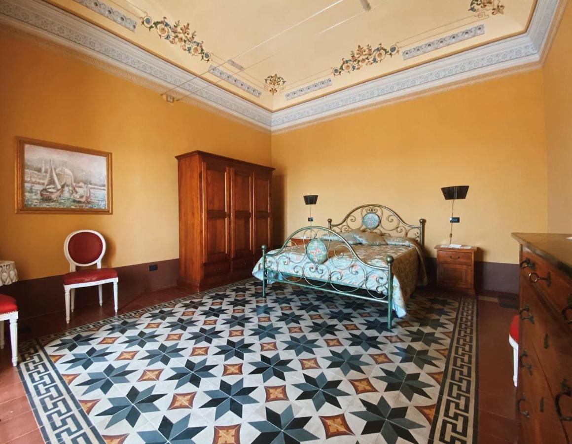 イスピカ Palazzo Gambuzzaアパートホテル エクステリア 写真