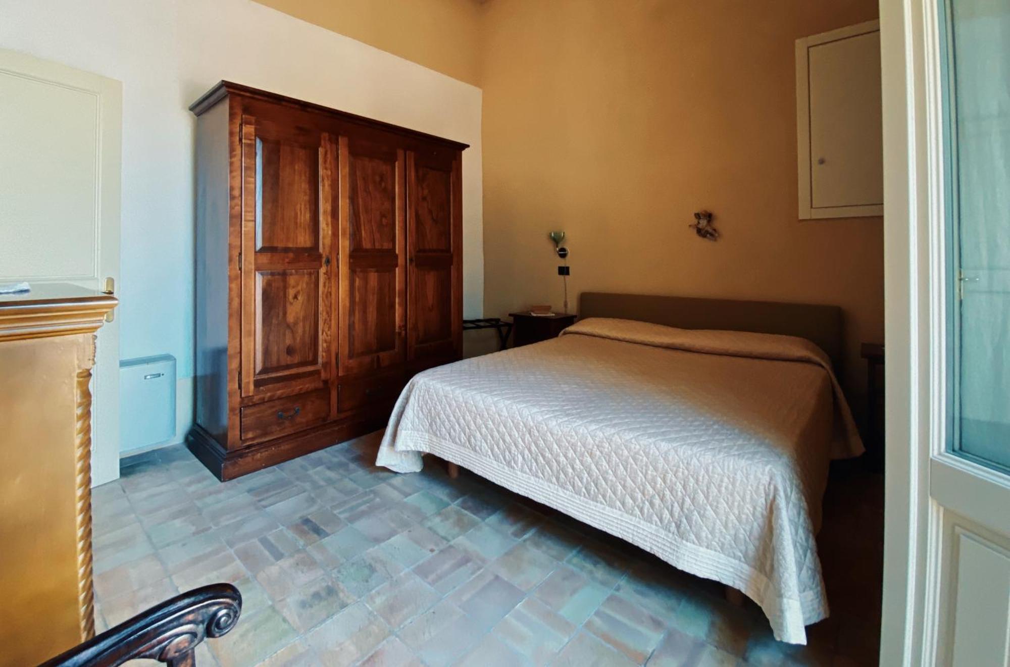 イスピカ Palazzo Gambuzzaアパートホテル 部屋 写真