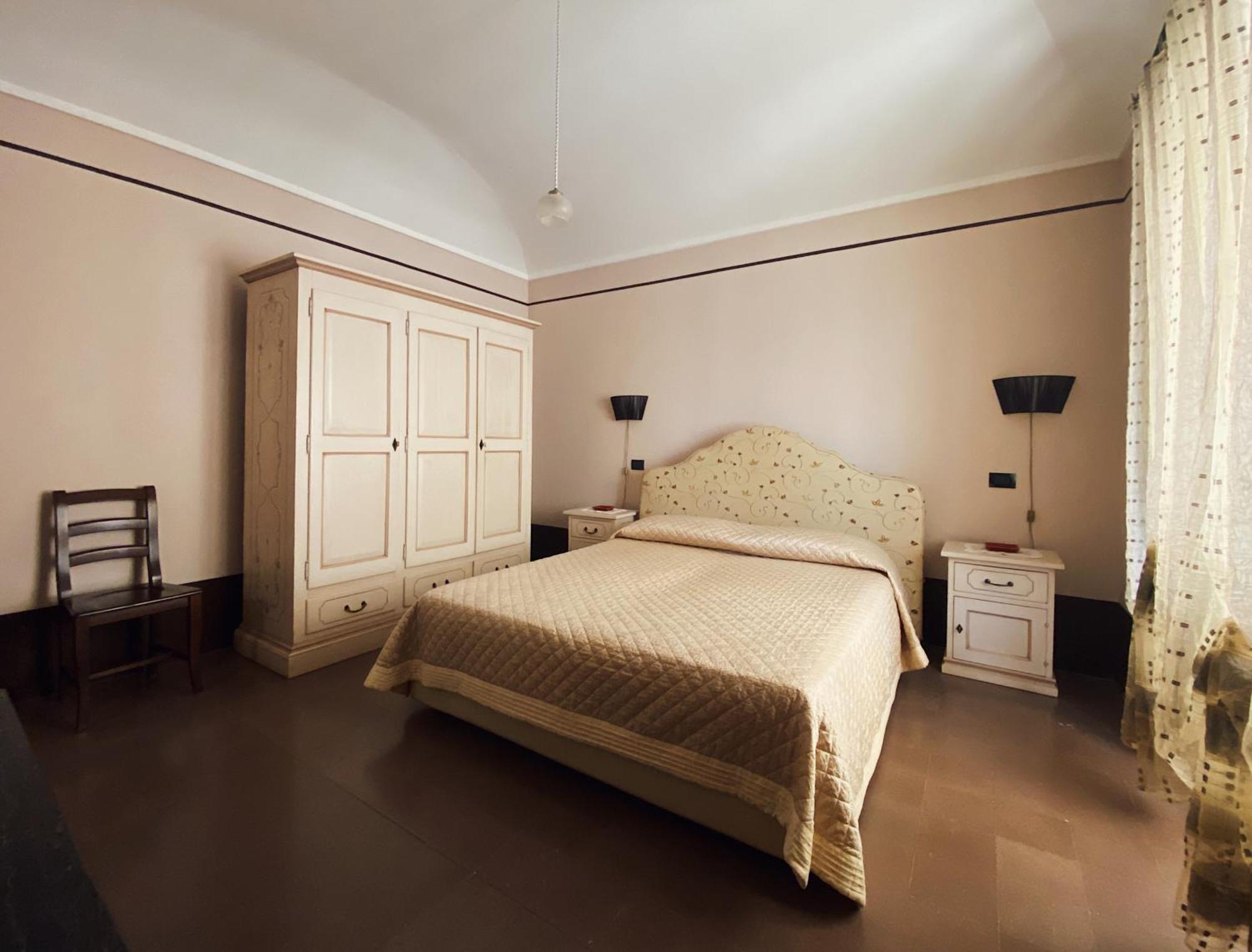 イスピカ Palazzo Gambuzzaアパートホテル 部屋 写真